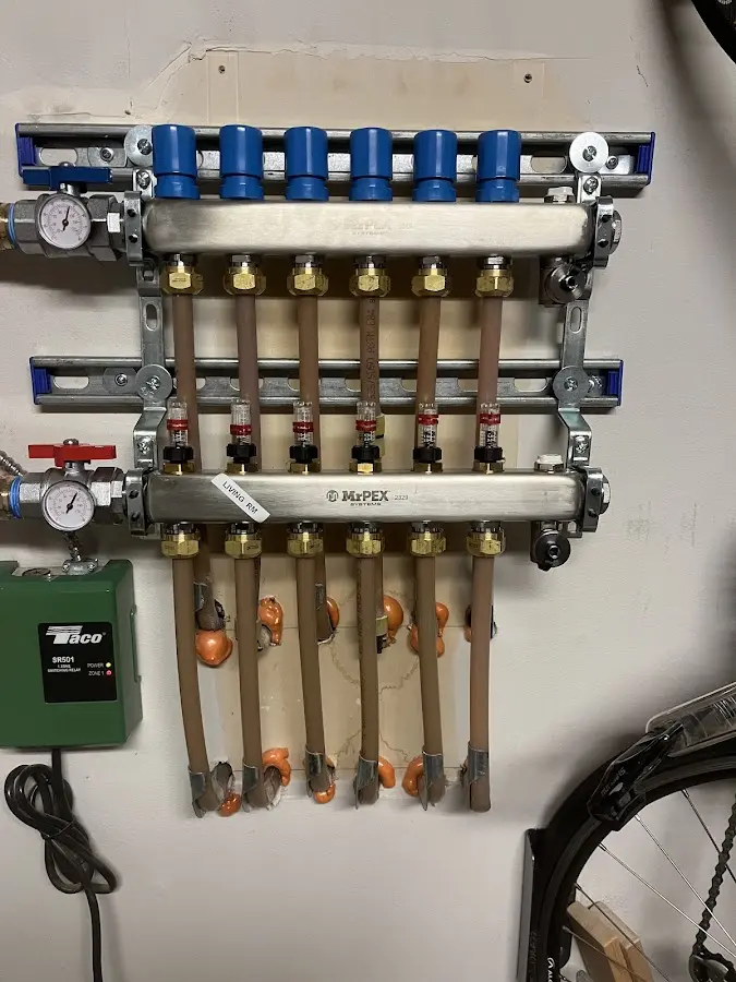 Plumber performing Gas Leak Detection at a residential property in Great Neck